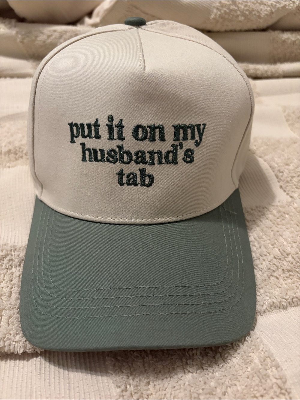 Put it on my husband’s tab hat